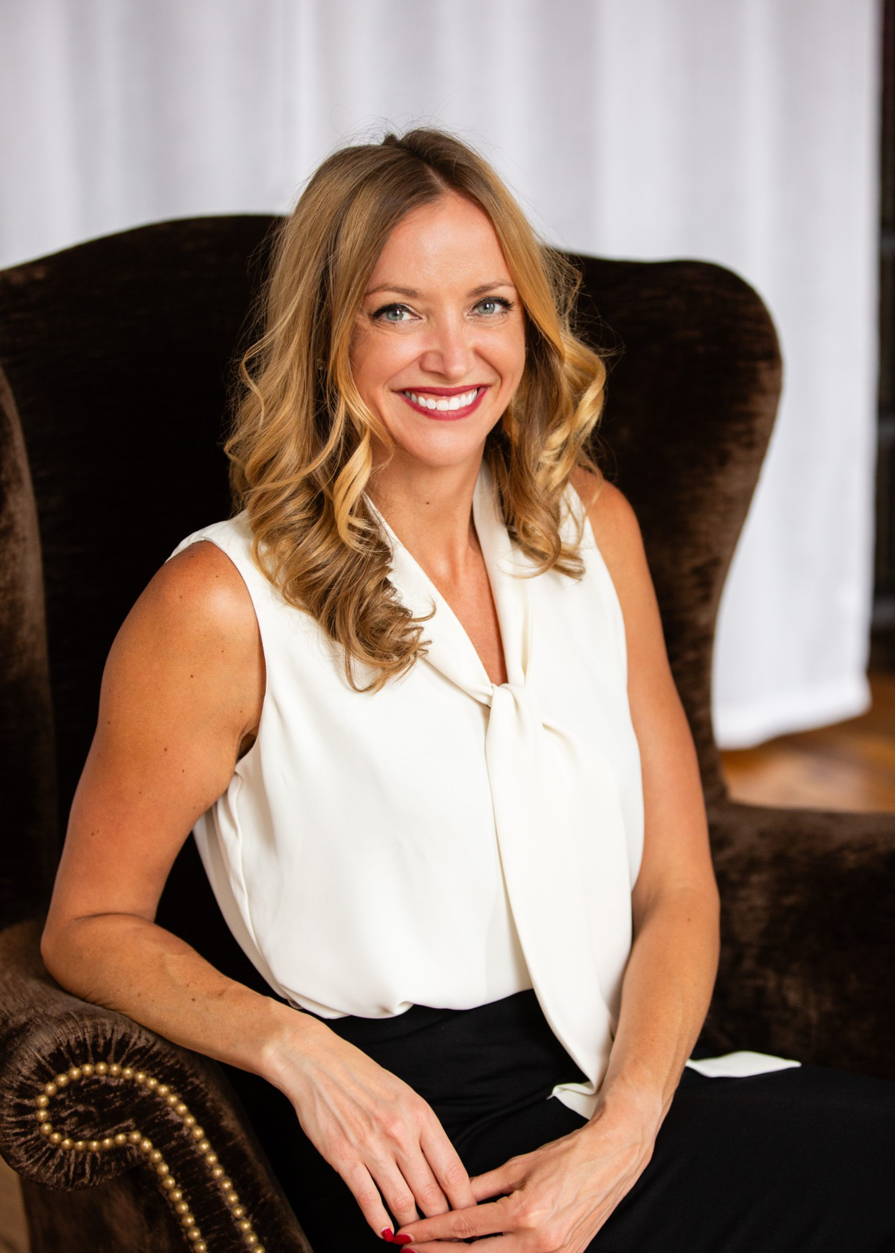 ERIKA WOZNIAK<BR>SENIOR VICE PRESIDENT